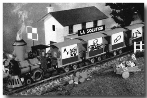 Photo d'archive du petit train interlude des années 50 et 60 : un train miniature passait devant l'écran. Sur chaque wagon, un indice pour résoudre un rébus. À la fin, on avait la solution. Le mot 